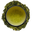 A cup of pale kukicha seen from above, ringed by kukicha stems and twigs on a white background