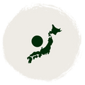 A dark green silhouette map of Japan with a black circle, centered inside a large textured off-white circular frame on a white background.